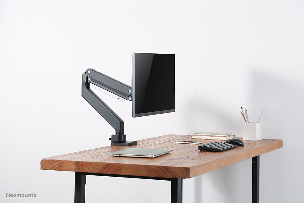Neomounts NM-D775black ass eng gasgefiedert Schreifdësch-Halterung fir Flatscreens bis 32 inch (81 cm) - Schwaarz