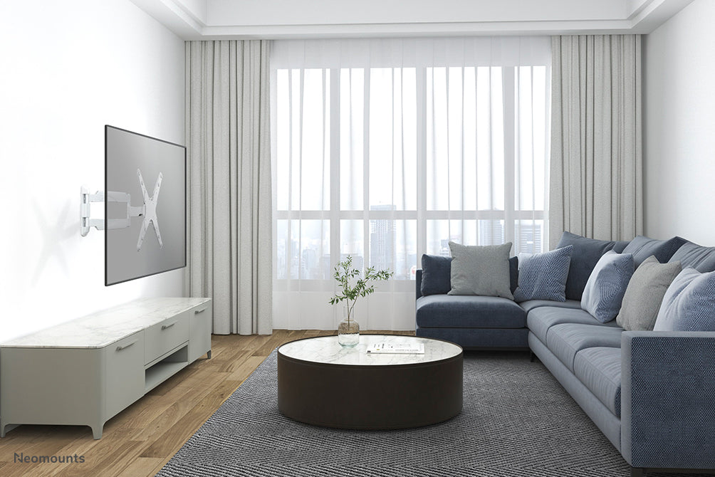 Neomounts NM-W440 wäiss ass eng Wandstëtzt mat 3 Dréipunkten fir Flat-Screens bis 55 inch (140 cm).