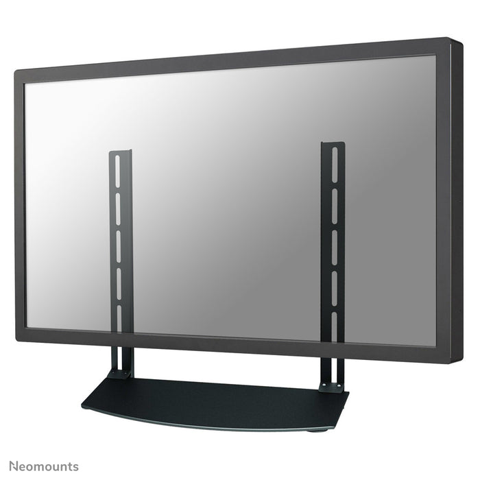 Neomounts AV-Halterung, Modell NS-SHELF100, ass ideal fir AV-Geräter ënner Flat-Screen-Halterungen ze placéieren.