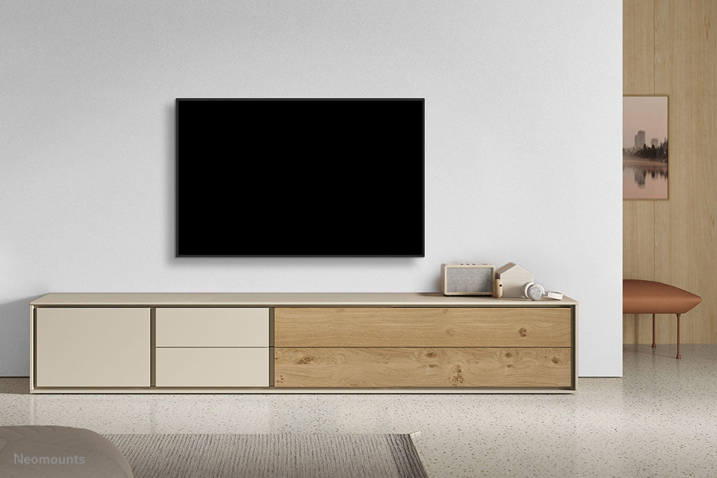 Neomounts WL35-550BL14 kippsbar Wandhalterung fir 32-65 inch Bildschirmer - Schwaarz