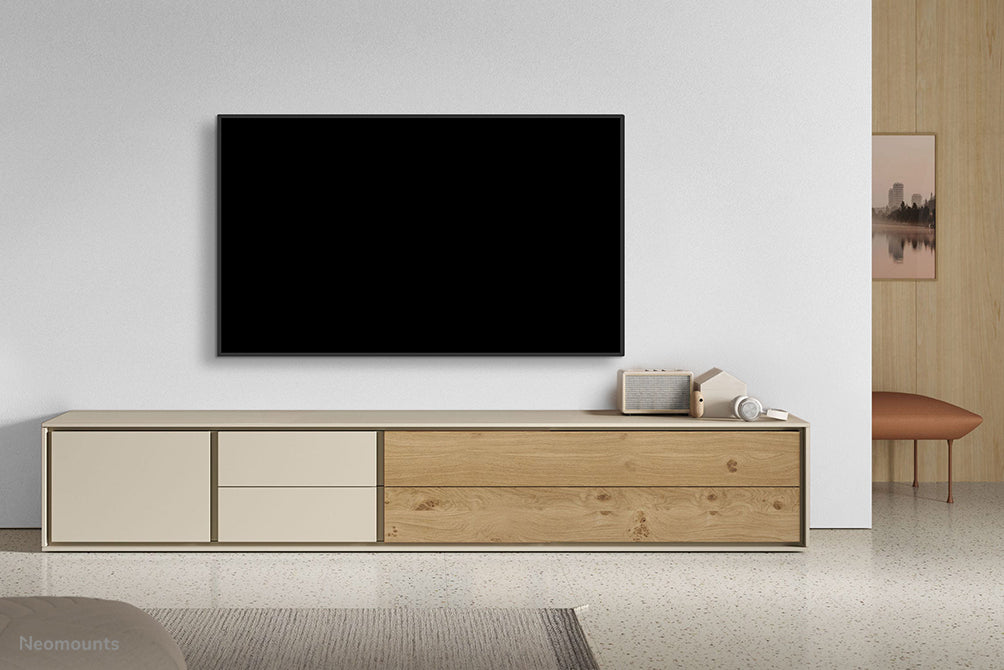 Neomounts WL35-550BL16 kippsbar Wandhalterung fir 40-75 inch Bildschirmer - Schwaarz