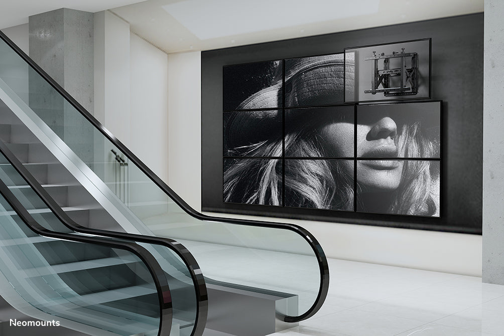 Neomounts WL95-900BL16 Push-to-Pop-Out Videowall-Halterung fir 45-75 inch Écrane - Schwaarz
