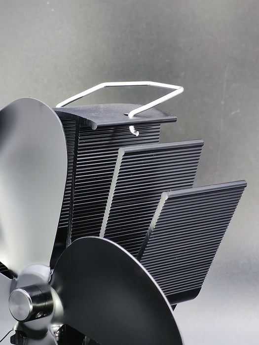 Kamäin-Ventilator Holzueweckel mat 4 Blieder - Eco Fan - Hëtzt ugedriwwene Ventilator